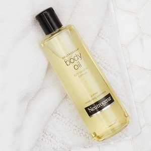Bottle of Neutrogena Moisturizing Sesame Body Oil for dry skin
